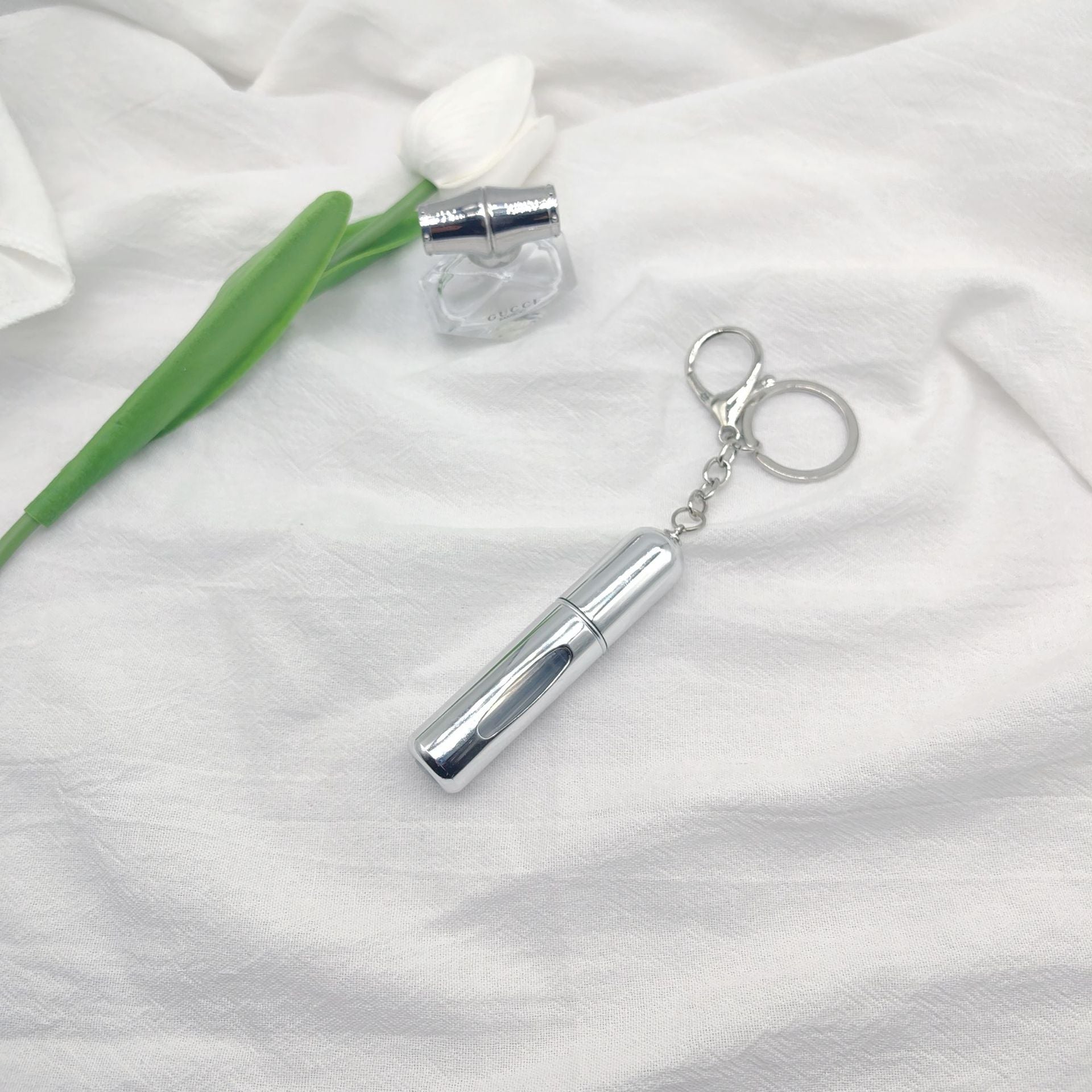 Wholesale bottom filling pump 5ml high color value sample key chain perfume bottle